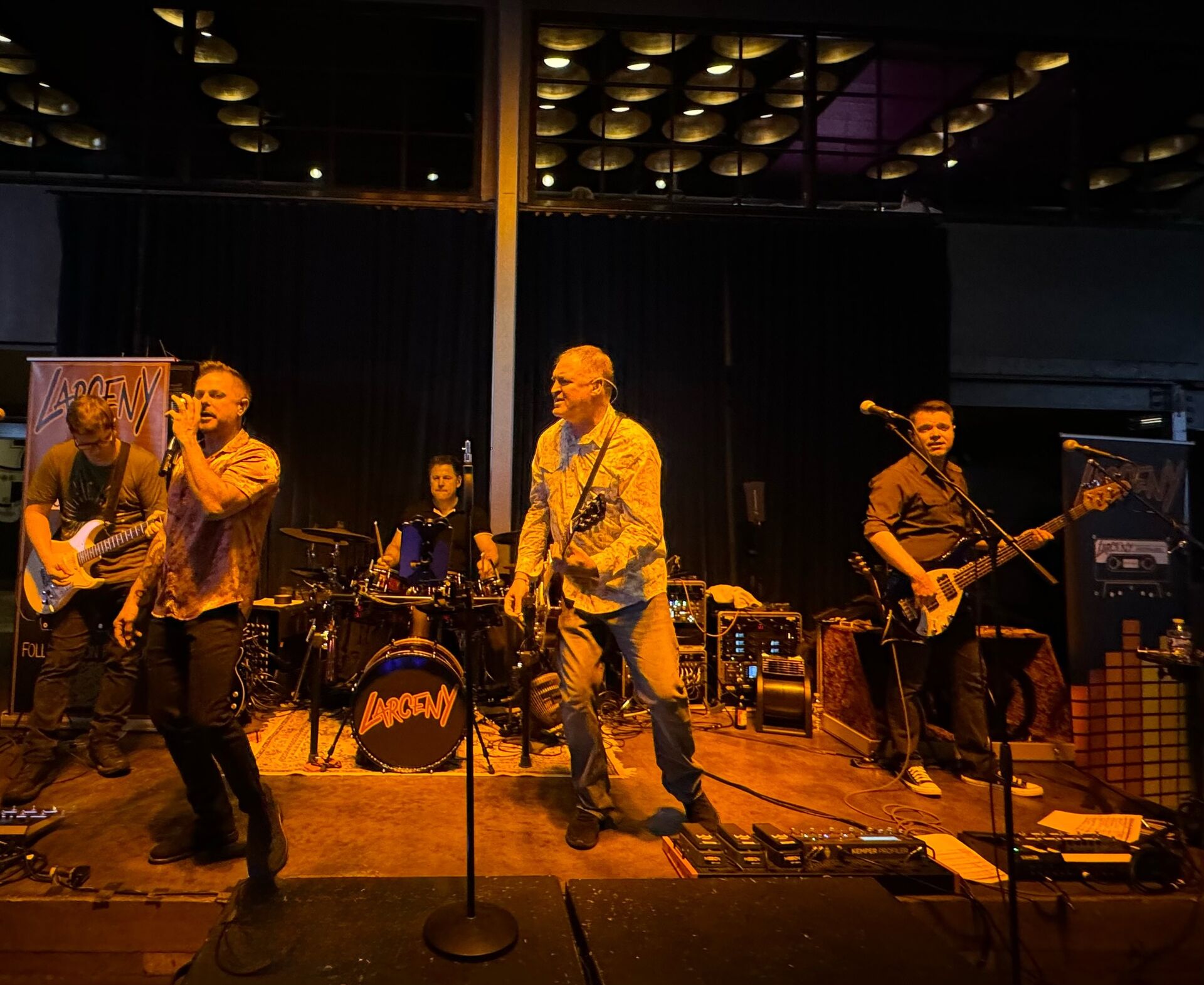 Full band on stage at live show