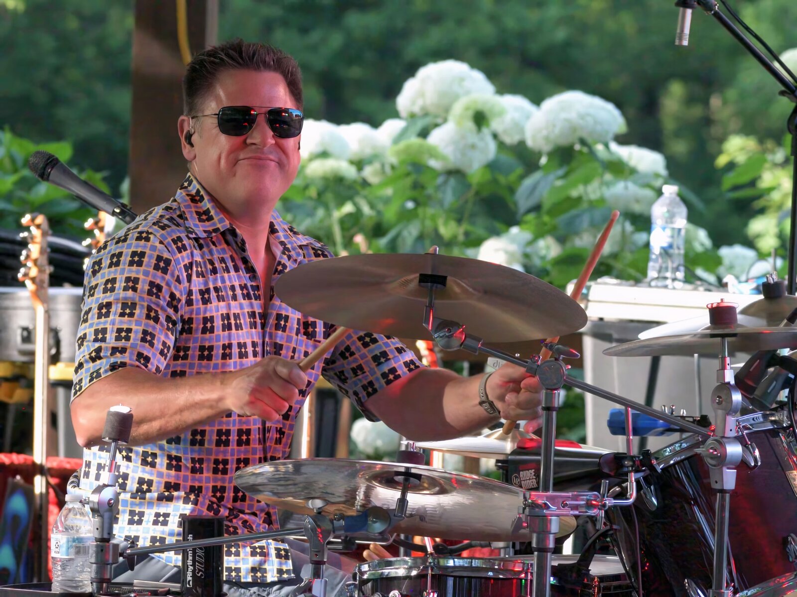 John Ebersohl outdoor performance with hydrangeas